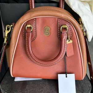 LIKE NEW!!  Used maybe 4-5 times. Runway Marleigh 20 Coach Bag.Orig Tags/Receipt